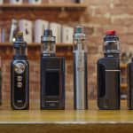 Electronic Cigarette On A Background Of Vape Shop